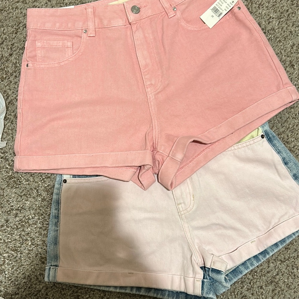 2 pair PAC Sun mom shorts 1 NWT, 1 gently worn. Size 28 & size 27